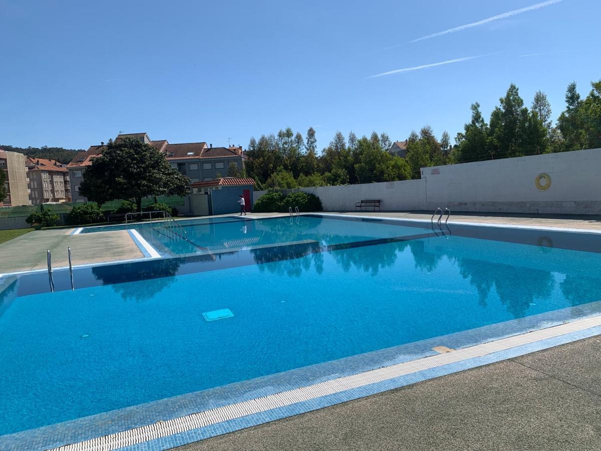 Urbanizacion Con Piscina Arnelas سانكسينكسو المظهر الخارجي الصورة
